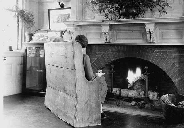 The fireplace in the reading room